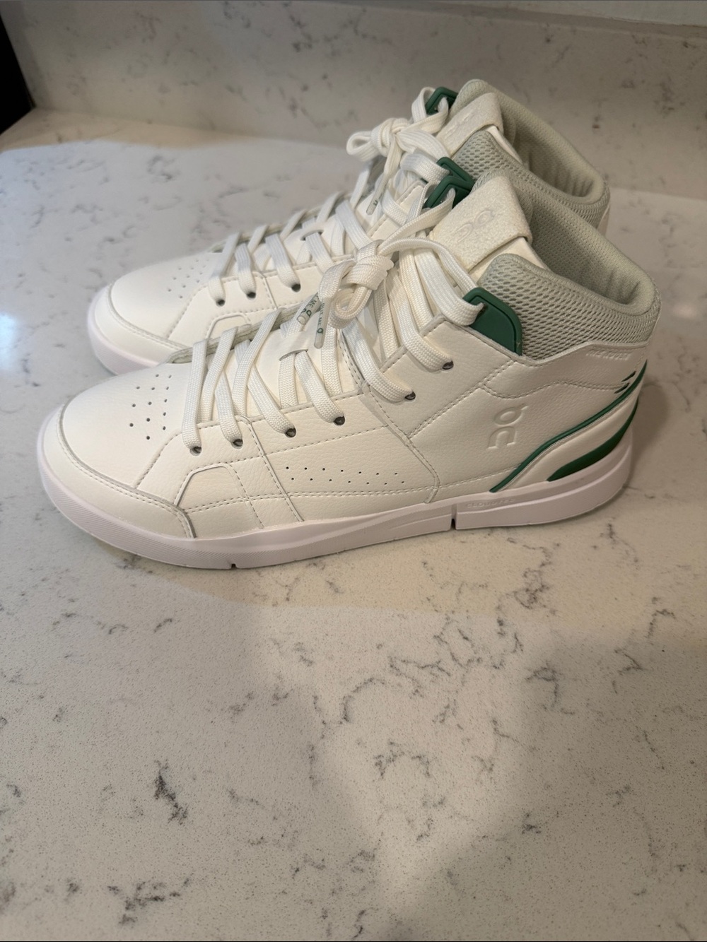 On Running White High-Top Sneakers with Green Trim